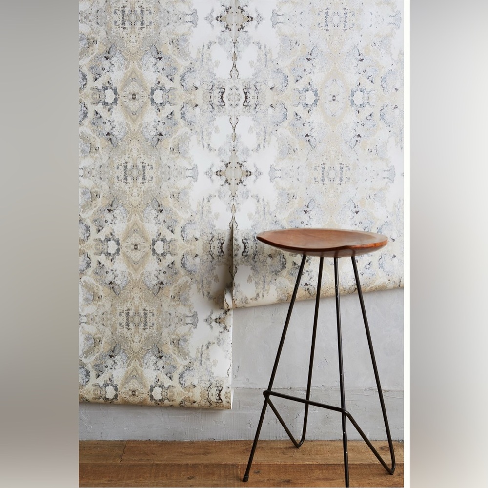 Two unopened rolls of Anthropologie Inner Beauty Wallpaperer